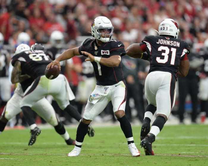 Cardinals quarterback Kyler Murray throws a pass against the Falcons during a game at State Farm Stadium. He was named the NFL's 2019 Offensive Rookie of the Year after breaking numerous franchise rookie records.